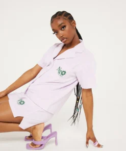 New Girl Order Tops NGO FLOWER LOGO TERRY SHIRT LILAC 9 New Girl Order Tops NGO FLOWER LOGO TERRY SHIRT LILAC